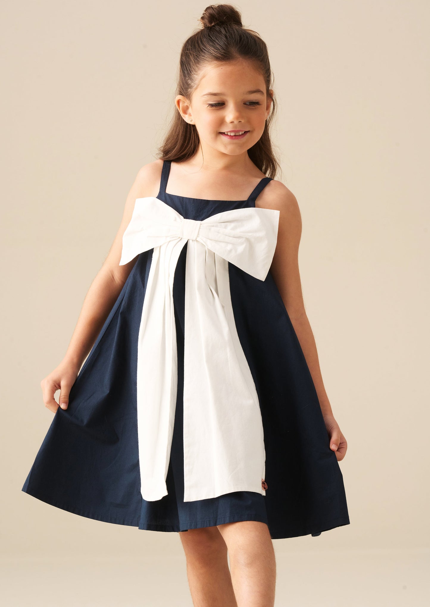 Girls Navy Statement Bow Dress | Angel & Rocket