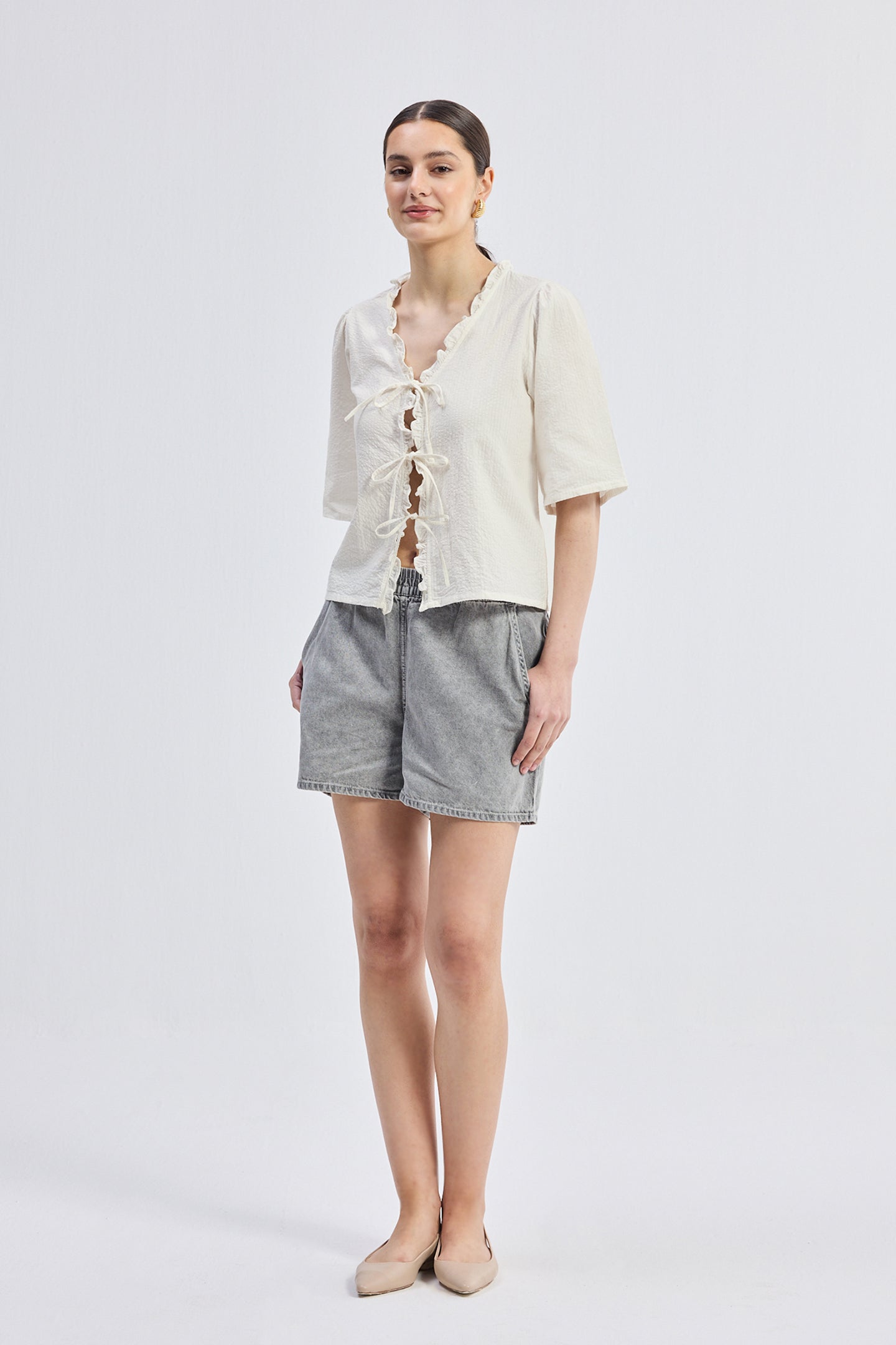 Relaxed Fit Top With Ruffles and Front-Ties in Cream