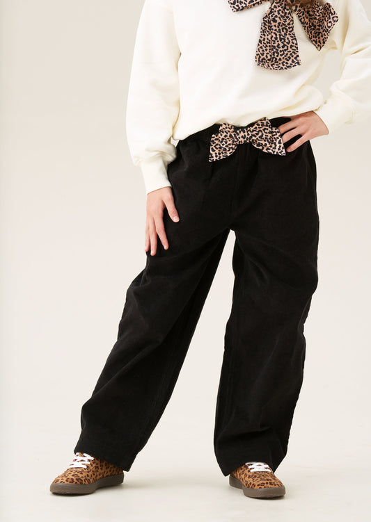 Girls Black Wide Leg Cord Trousers with Animal Print Bow | Angel & Rocket